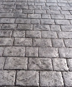 Old style cobblestone stamped concrete pattern.