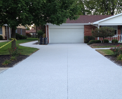Nicely done textured concrete driveway.