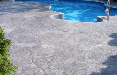 In ground pool with decorative pool deck in Indiana.