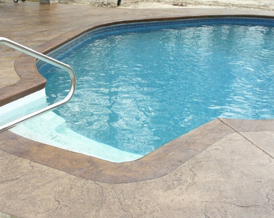Stamped concrete indoor pool deck. 
