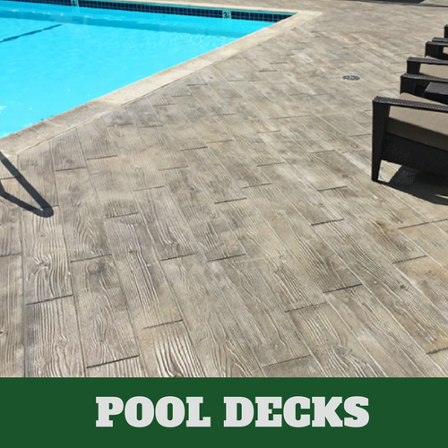 Eklhart stamped concrete pool surround with a wood grain finish.